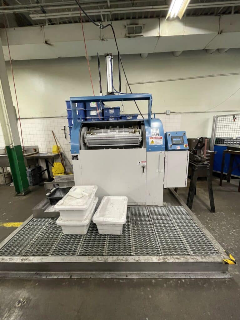 An HZ-85 installed in a contract manufacturing shop producing medical parts.