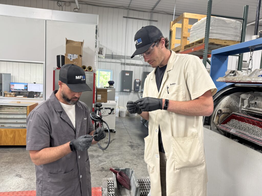 Mass Finishing Test Lab Technicians Analyzing Parts That Were Just Run Through An HZ-85 Machine